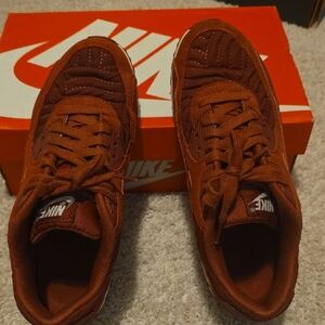 Nike womens Burnt Orange Quilted Sneakers